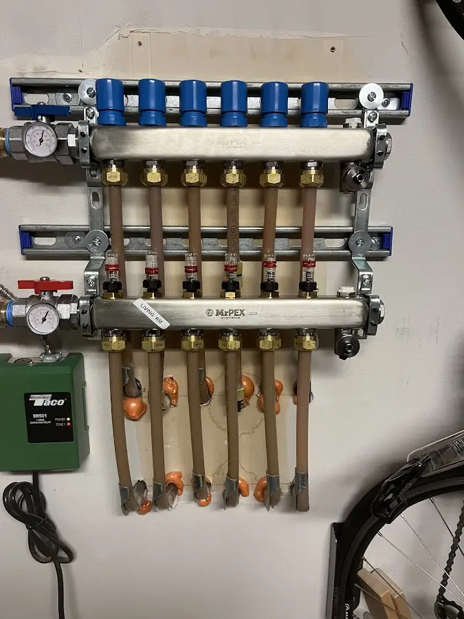 Plumber performing Sink Repair at a residential property in Smith